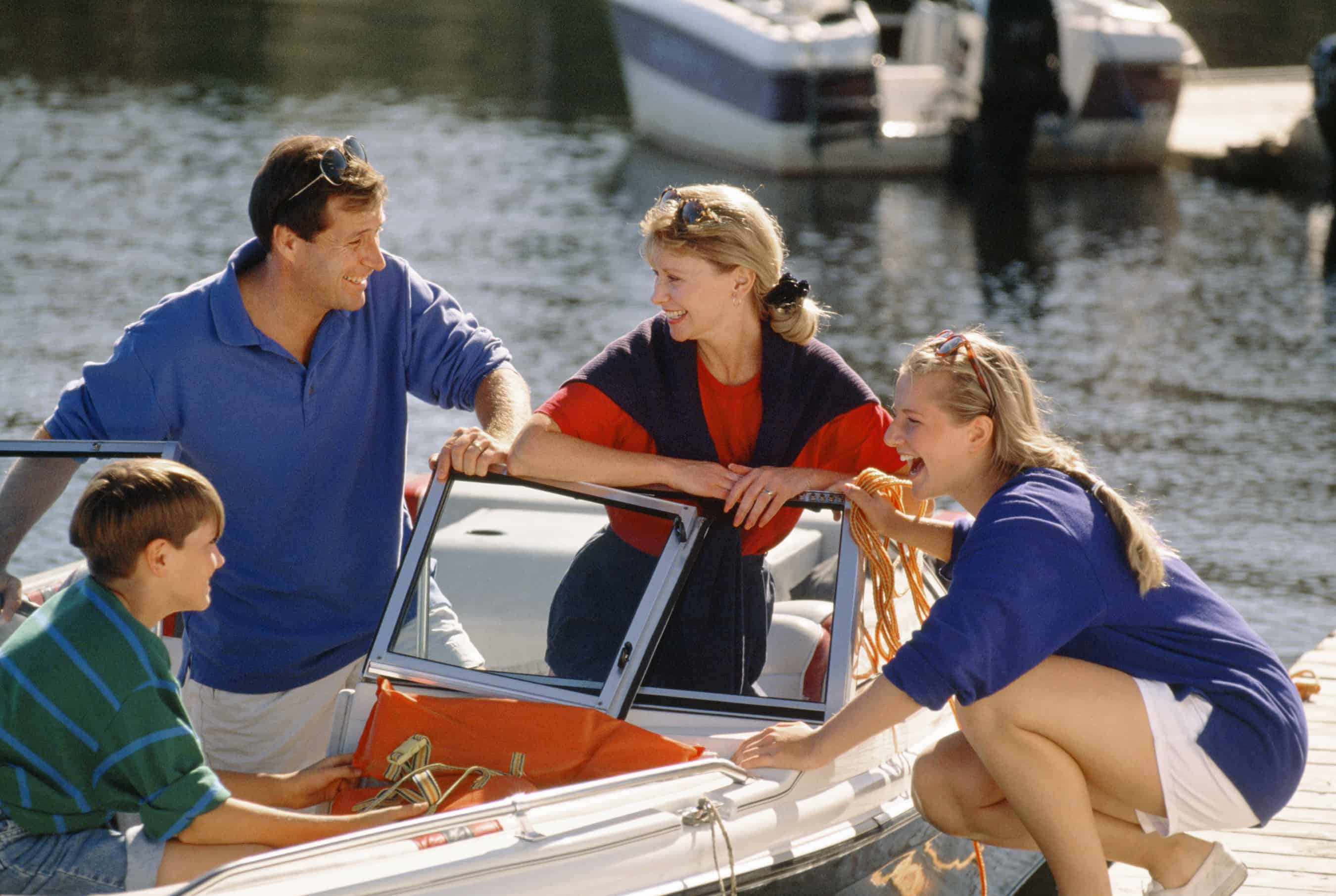 Family enjoying time on their boat with new boat glass windows