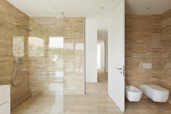Euro glass shower doors give a remodeled bathroom a feel of luxury