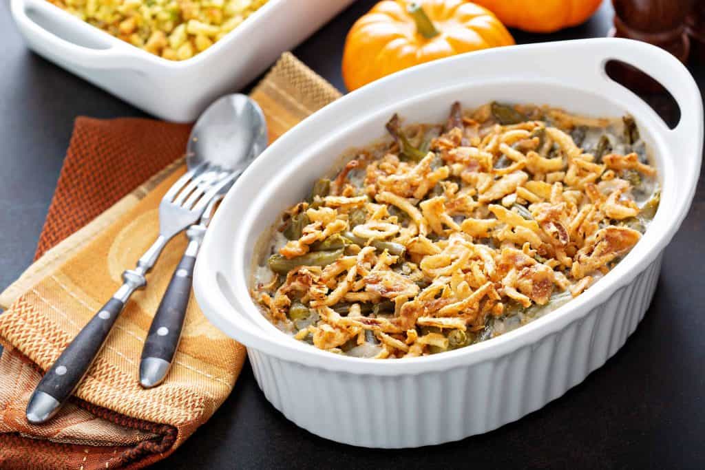 Geen bean casserole set on table ready for Thanksgiving dinner