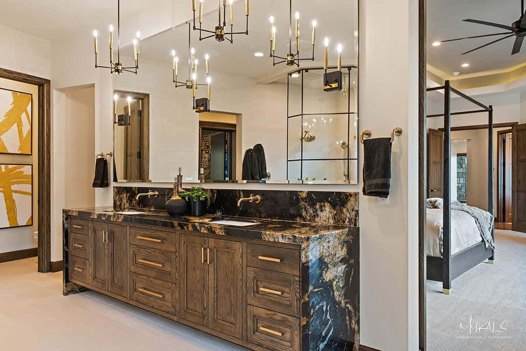 Gorgeous luxury bathroom in home in Utah Parade of Homes with custom mirror bathroom vanity